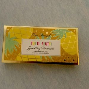 Too Faced Sparkling Pineapple eyeshadow pallet.
